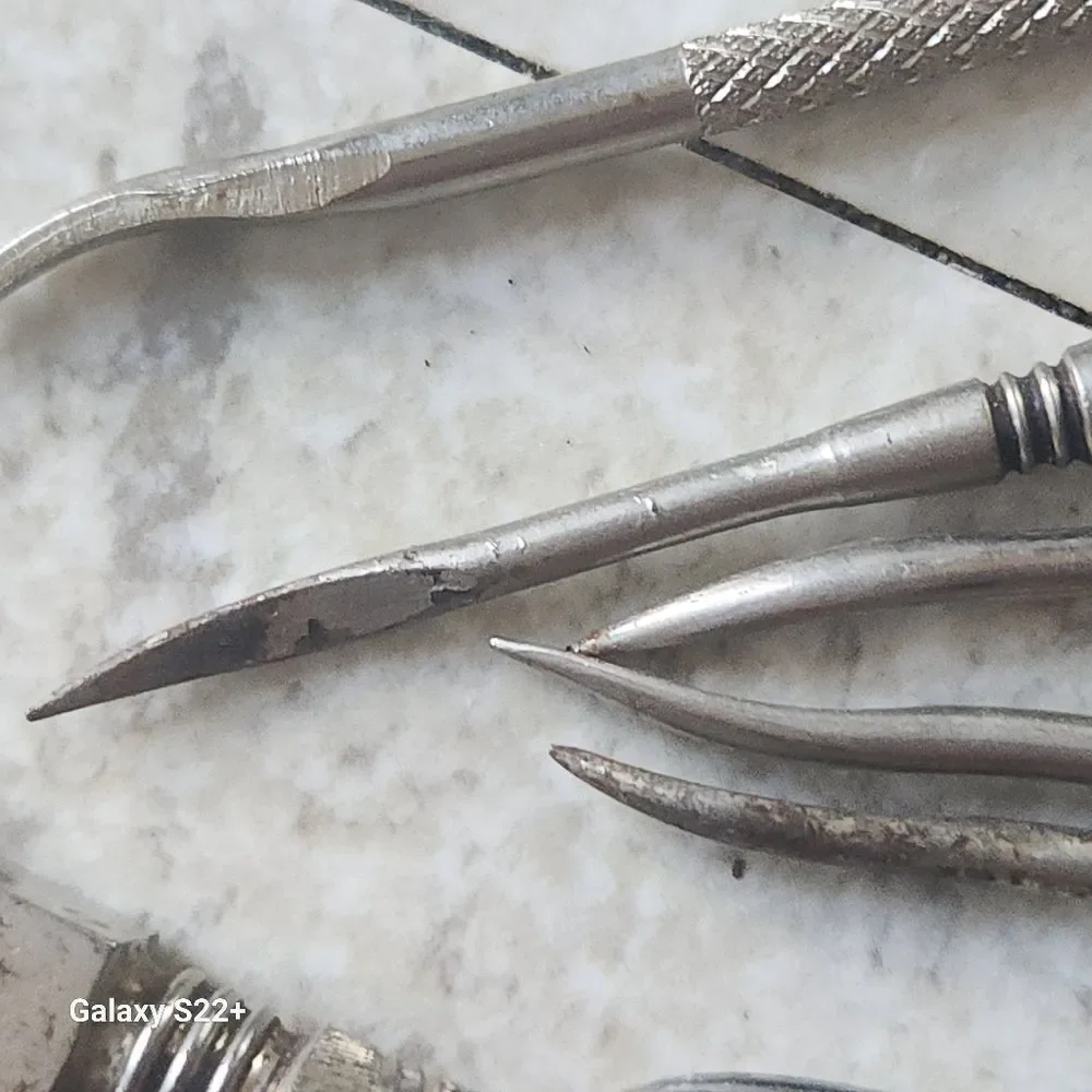Silver metal Vintage Embossed Nutcracker & Six Picks set